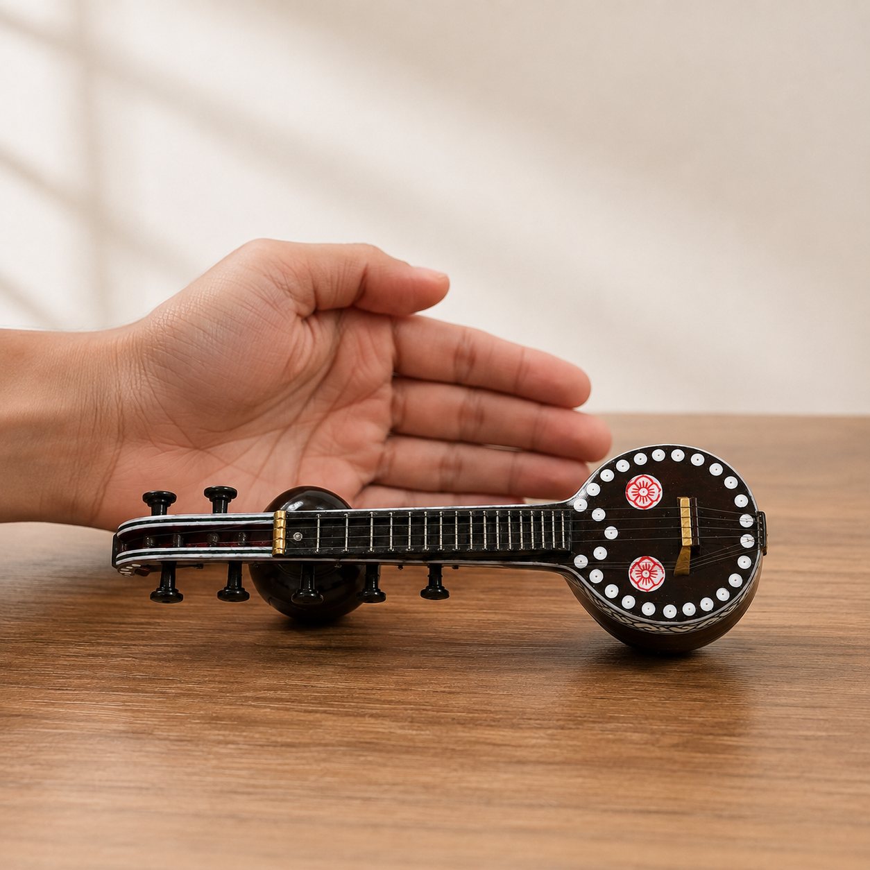Scale comparison of the Bobbili Veena miniature